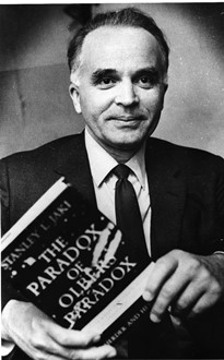 1969 – With a copy of <I>The Paradox of Olbers' Paradox