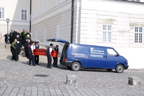 The coffin being brought to the nearby Chapel of Our Lady