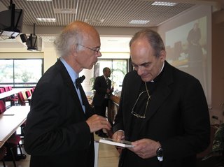 H.E. Mgr. Marcelo Sanchéz Sorondo speaking with Jacques Vauthier