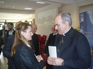 H.E. Mgr. Marcelo Sanchéz Sorondo speaking with Lucía Guerra Menéndez