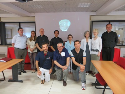 A group of speakers and participants at the end of the Summer Course