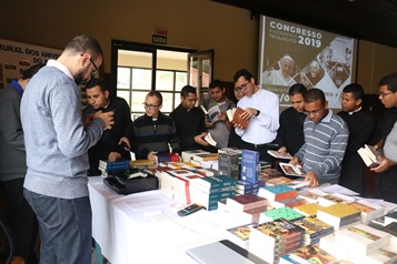 People at the bookstand.